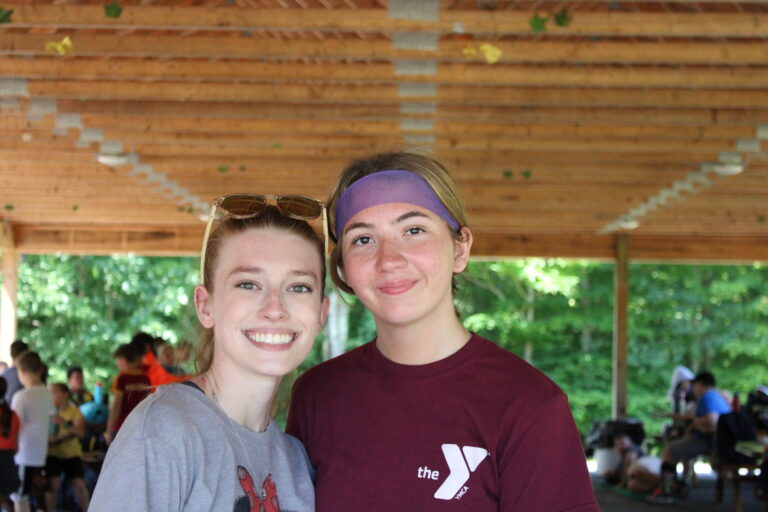 Two camp girls posing for a photo