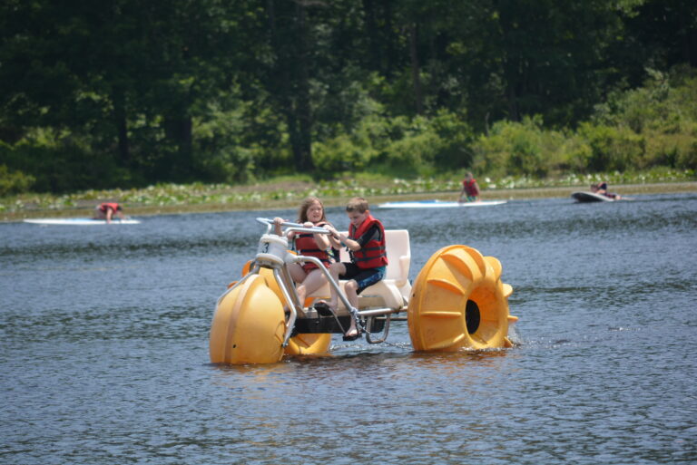 Kids on a water vehicle